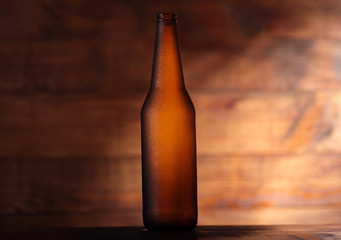 empty brown beer bottle