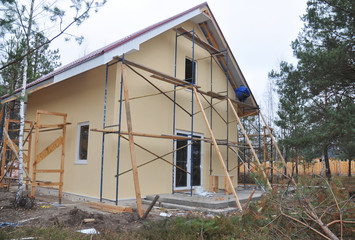 House renovation with painting wall and installin soffit and fascia vinyl boards
