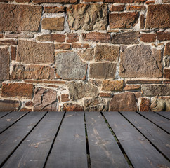 stone wall and timber floor