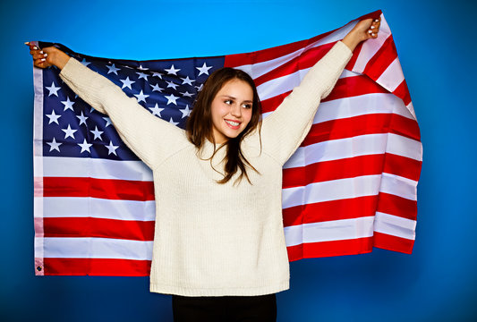 Young Girl Wrapped In American Flag