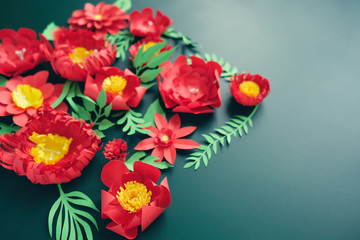 Hello, spring. With red paper flowers and green leaves