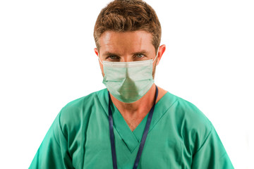 Fototapeta na wymiar attractive and successful medicine doctor or nurse man posing confident for hospital staff corporate portrait in green medical uniform and face mask isolated on white