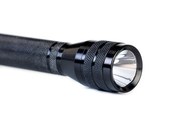 Black flashlight isolated on a White Background