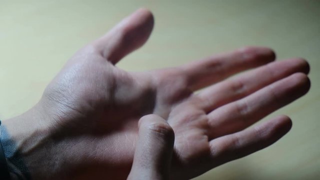 Palmistry. Lines and signs on the skin of a male palm