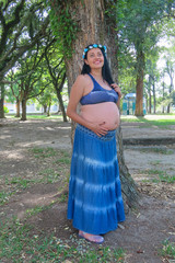 pregnant woman in blue dress