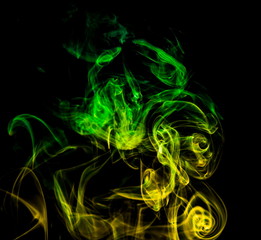 Colored smoke on black background