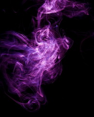 Purple smoke on black background