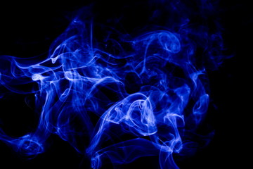 Blue smoke on black background