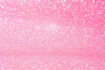 Horizontal pink glitter background with blur and bokeh
