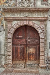 Fototapeta na wymiar Detail of the facade of Palazzo Quetta-Alberti-Colico in Trento, Italy