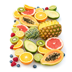 Fresh fruit healthy diet concept. Tropical mixed citrus food background, pineapple, orange isolated on white. Colorful fruits berries. Dieting health meal vegetarian health concept