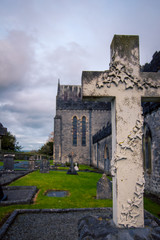 Fototapeta na wymiar Cross in a graveyard in Ireland