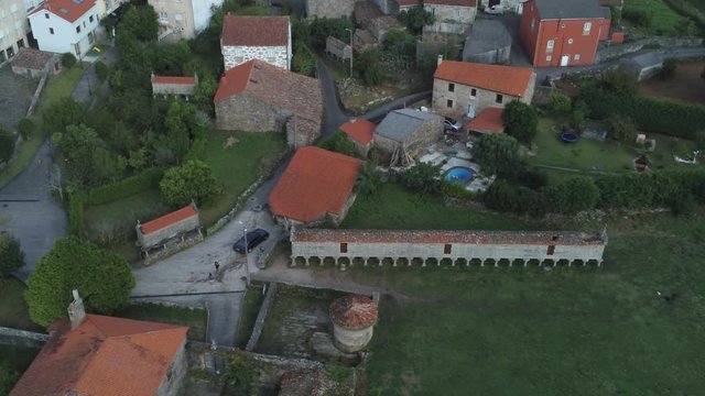 Drone view of the horreo de carnota ( long grain storage container ) and residential area of the city of Carnota, Spain, Europe