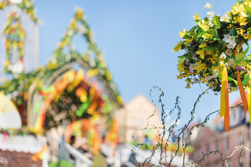 Blurred background of Easter market at the Old Town Square in Praguet, Czech republic, copy space