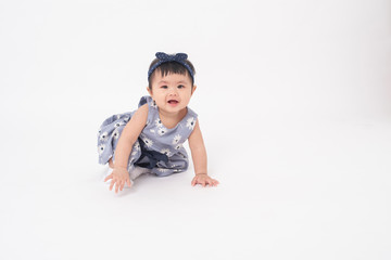 Adorable Asian baby girl is portrait on white background