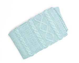 handmade wool scarf on vertical image, selective focus.mint trend color