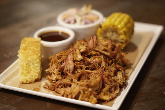 Barbecue Smoked Brisket and Ribs Platter with Pulled Pork and Sides
