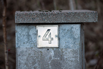 number 4, four on brick walltext, on paper, back to school, stockholm,sweden, nacka, sweden