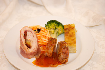 hazelnut roll with brown sauce ,turkey, spaghetti and broccoli romanesco