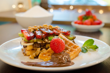 Ready to eat waffle with Strawberry and chocolate- Stock image