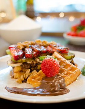 Ready to eat waffle with Strawberry and chocolate- Stock image