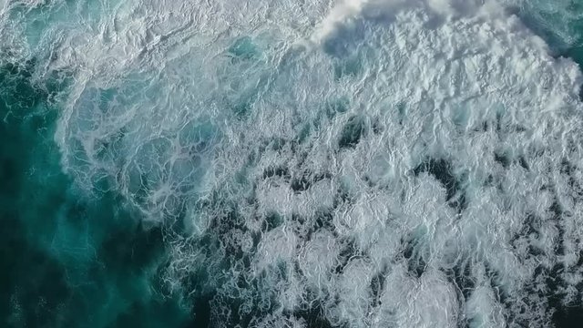 Top down aerial view of sea waves