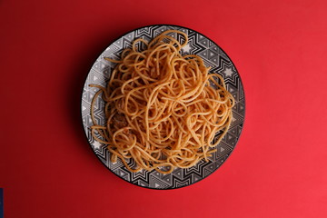 plate of spaghetti pasta with tomato