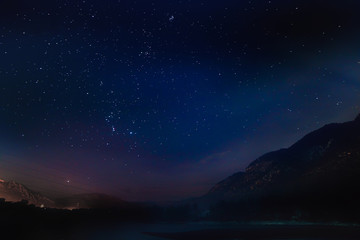 starry sky at night in the mountains