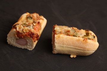 hot dog with cheese and pepper