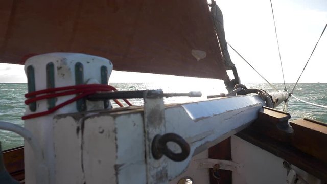 SLOW MOTION Travelling Shot of Bowsprit Traditional Gaff Rigged Vessel
