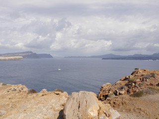 Views of the caldera, mountains, the Mediterranean Sea, and the city of Fira from the Akrotiri Lighthouse.