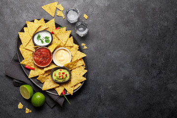 Mexican nachos chips and tequila