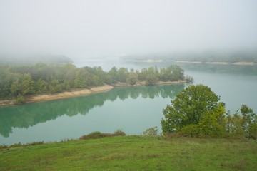                    Morning fog at Lake Barrea within the National Park of Abruzzo, Lazio and Molise            