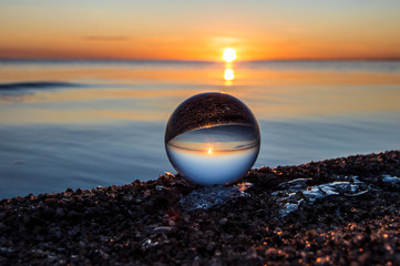 glass ball on the beach