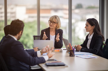 female manager explained the working principles for the work members