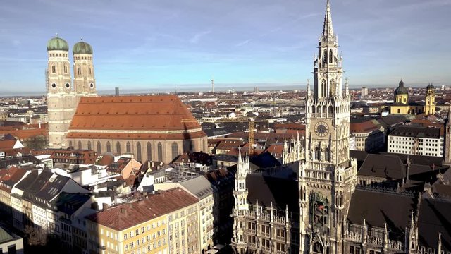 Stunning aerial view at famous Munich tourist sights. So called "Frauenkirche", "Marienplatz" and "Odeonsplatz" in frame.