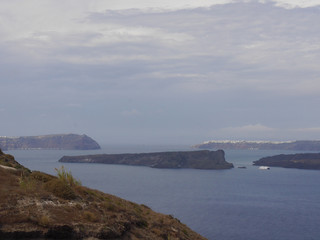 Views of the caldera, mountains, the Mediterranean Sea, and the city of Fira from the Akrotiri Lighthouse.
