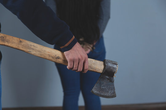 man hand ax with woman