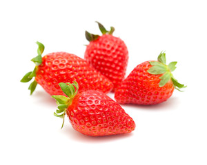 red ripe strawberries on white