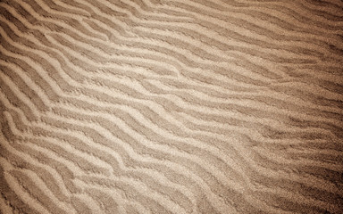 sand and wind pattern on dunes