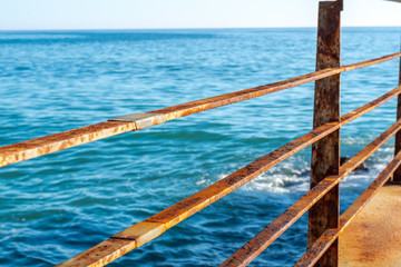 Naklejka premium Iron rail near the sea- Albufeira / Portugal 01.02.2020