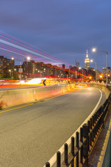 View on FDR and Midtown Manhattan at sunset with long exposure
