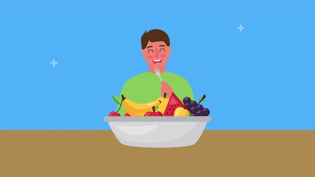 young man with fresh healthy food in bowl