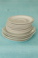 stack of empty white plates