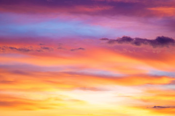Red and yellow clouds in the sunset sky - Powered by Adobe