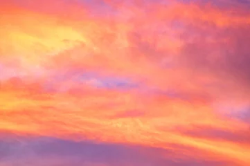 Tuinposter Red and yellow clouds in the sunset sky © onyx124