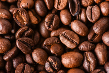 Coffee roasted beans background. Copy space for text.