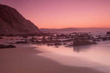 Fototapeta na wymiar red sunset in the basque coast, spain