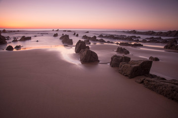 sunset on the beach in barrika, basque country
