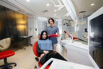 The dentist conducts an examination and consultation of the patient. Dentistry
